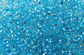 67010 10/0 чеський бісер Preciosa,  блакитний, прозорий з блискучим срібним отвором
