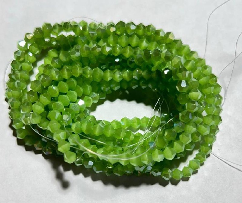 Біконуси 4 мм, салатовий натуральний