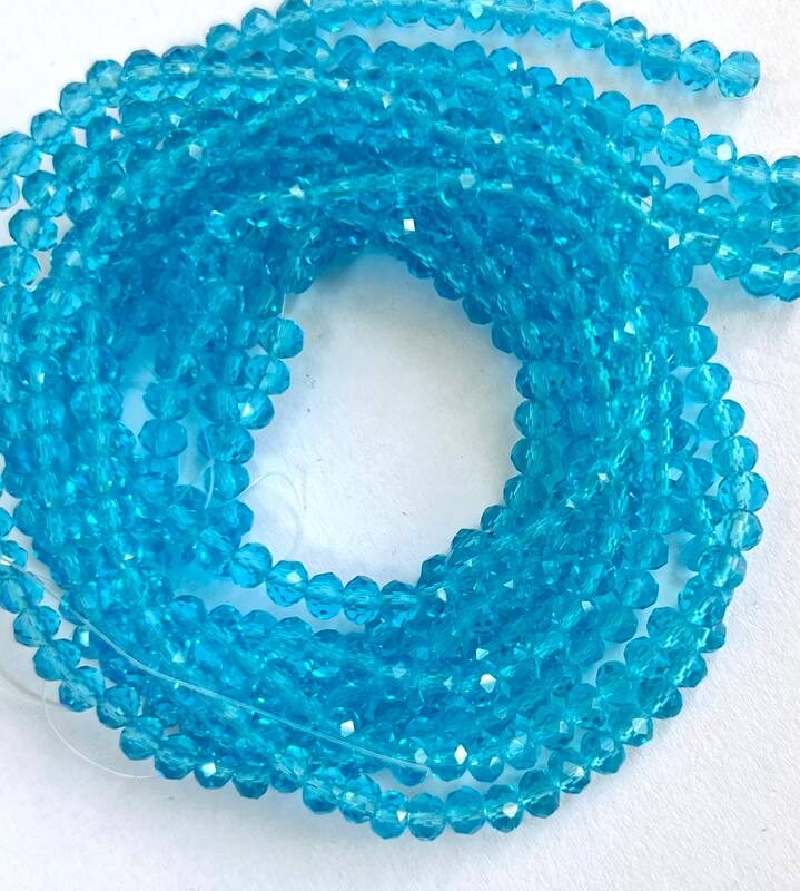 Ронделі 4 мм,  блакитний прозорий