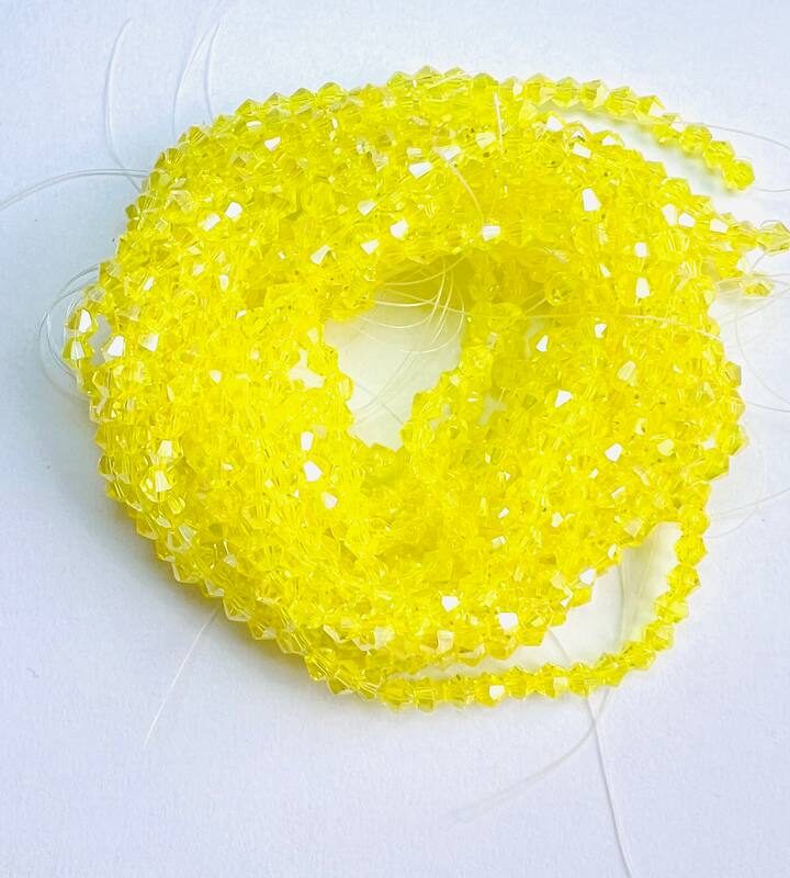 Біконуси 4 мм, жовта прозора з переливом