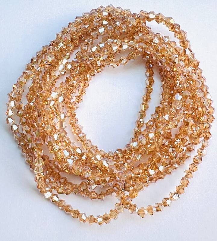 Біконуси 4 мм, медовий з переливом