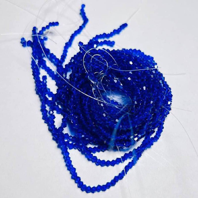 Біконуси 2мм, синій прозорий