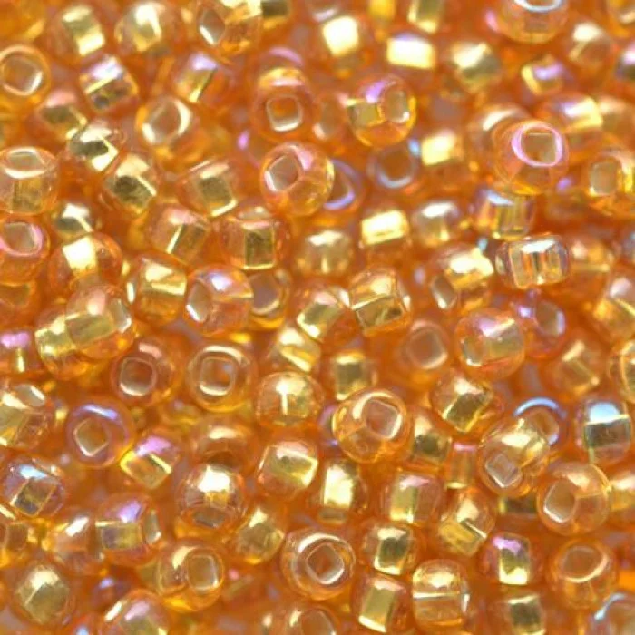 17059 10/0 чеський бісер Preciosa, помаранчевий світлий, прозорий райдужний з блискучим срібним отвором