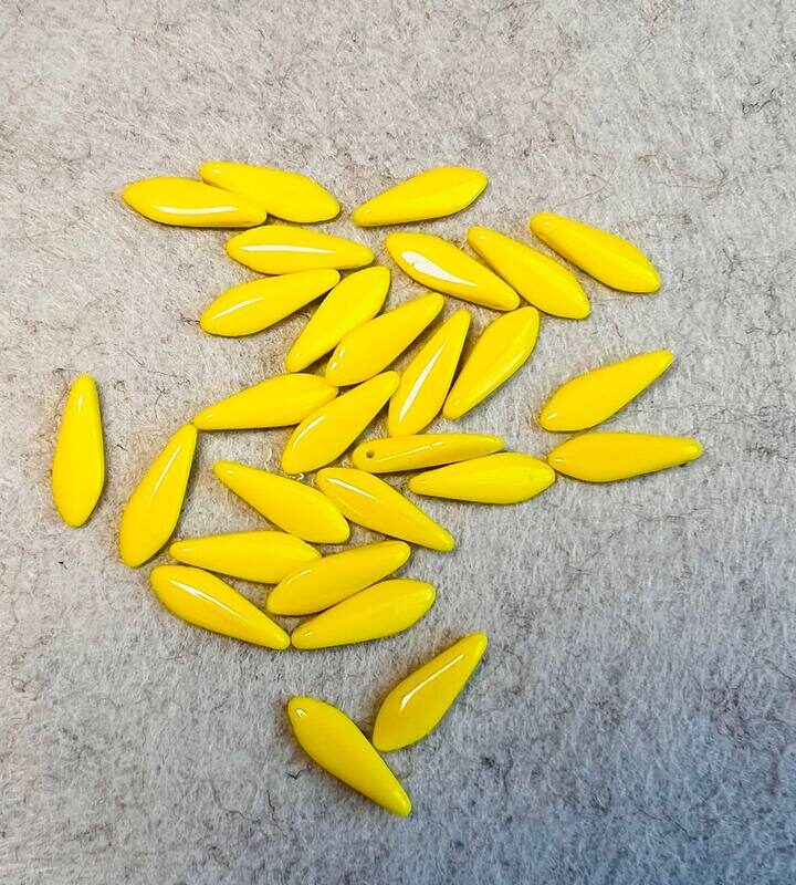 Намистини DAGGERS натуральний жовтий 83120