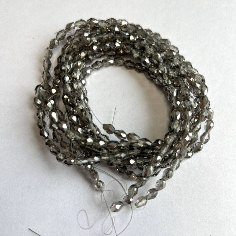 Капелька 4х6 мм, сіра прозора 01141