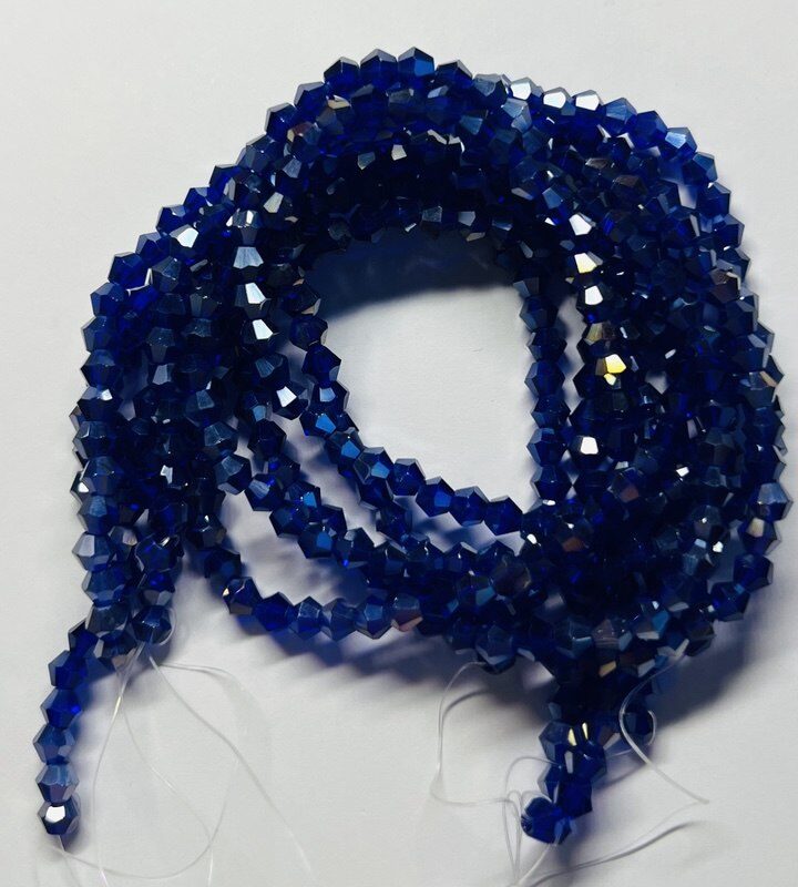 Біконуси 4 мм, темно синій прозорий з переливом