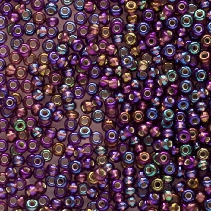 27069 10/0 чеський бісер Preciosa, фіолетовий, прозорий райдужний з блискучим срібним отвором